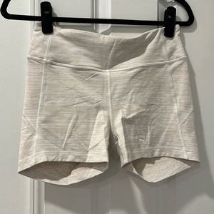 Outdoor Voices cream spandex shorts